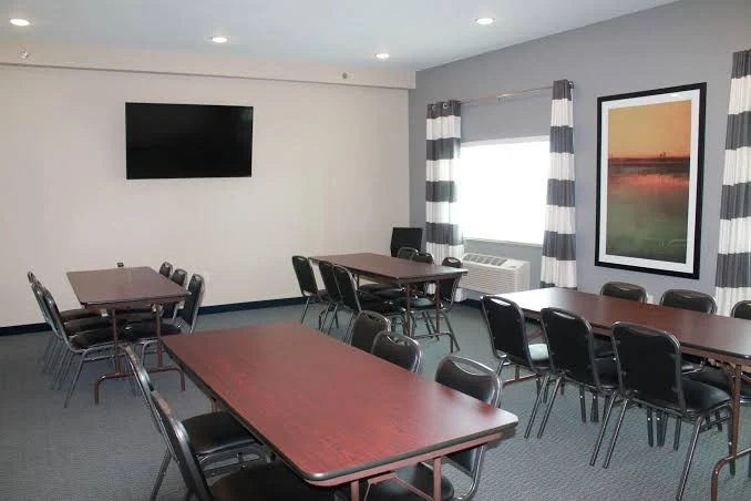Meeting and event room with wall-mounted TV