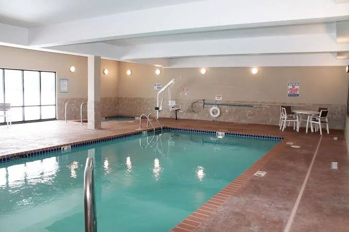 Heated indoor pool with accessible pool lift